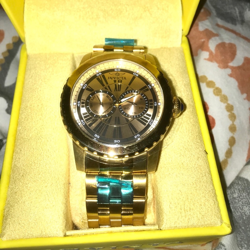 Men’s gold Invicta watch